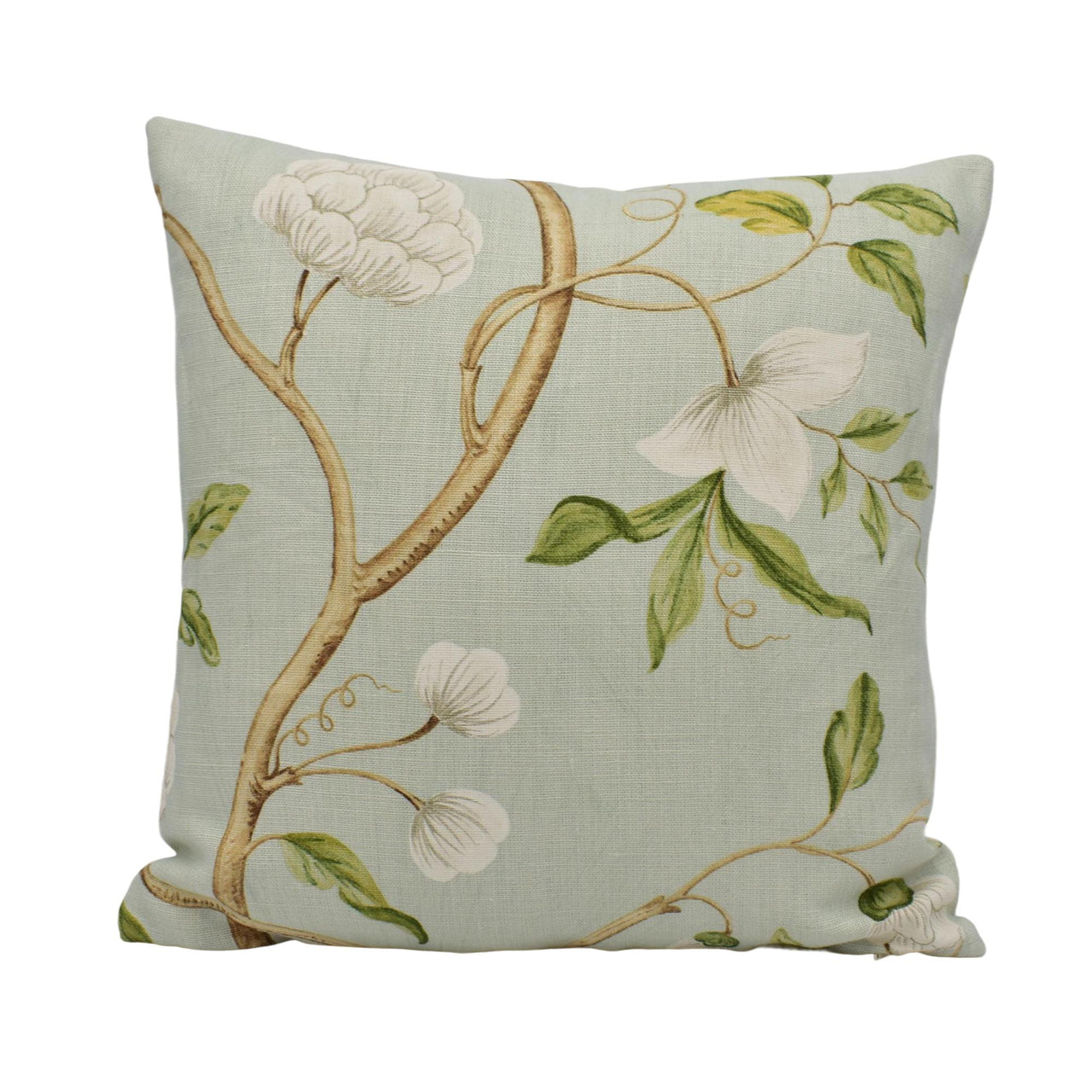 a blue pillow with white flowers on it