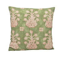 Thumbnail for a green pillow with pink and white flowers on it