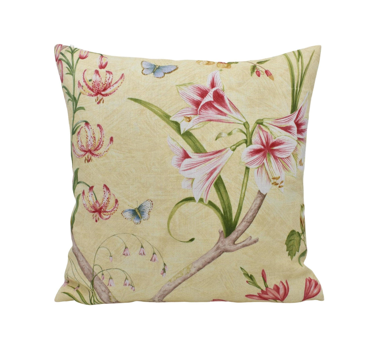 a yellow pillow with pink flowers and butterflies on it